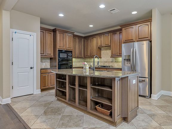 5th image of 11629 Woodland Hills Trl