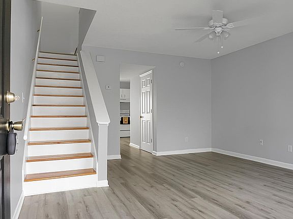 Entrance - beautiful oak tread stairs lead to upstairs bedrooms