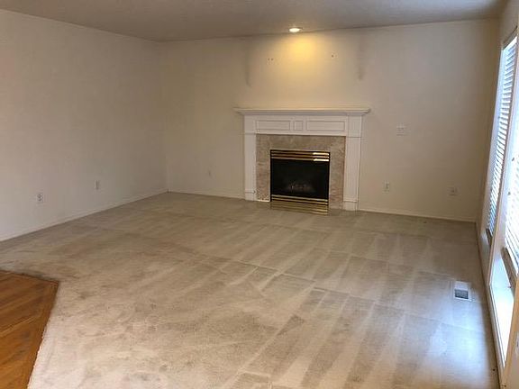 Living room with open access to kitchen