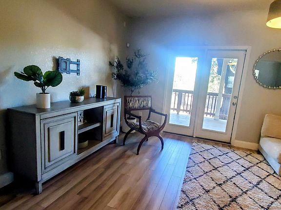 Living Area with Back door to Back Covered Patio