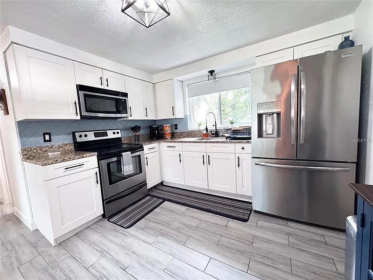 9616 Pine Ridge Ave — Photo 9