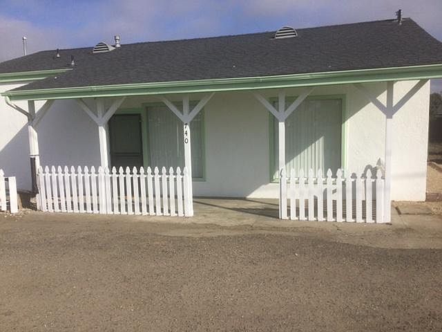 Front door and porch of the house