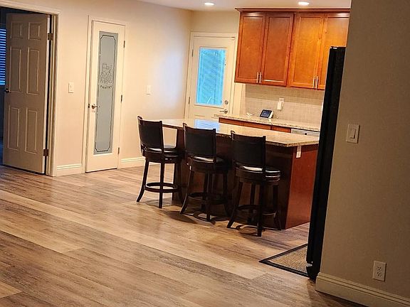 Island seating on back side of kitchen
