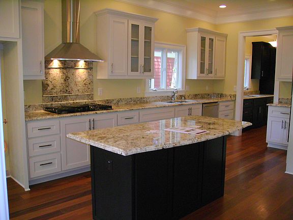 Gourmet Kitchen W/ Premium Granite,Custom Cabs & Hi-End Appliances.