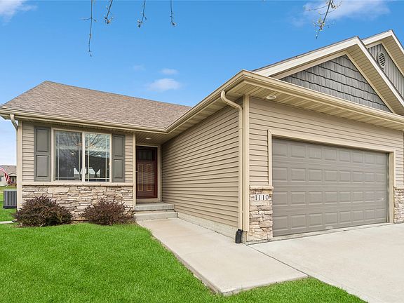 Entrance & 2-car garage