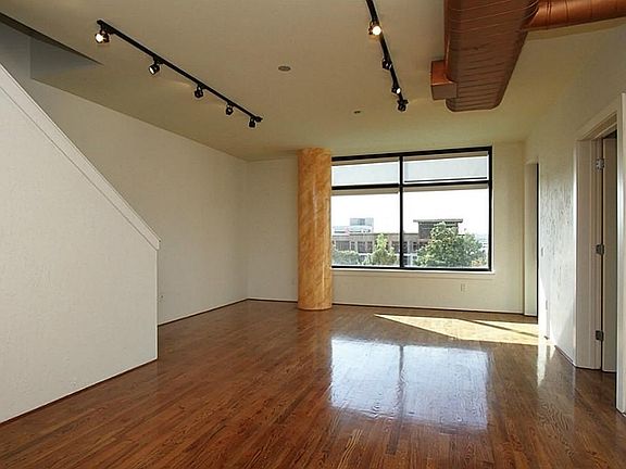 Front door view as you walk into this beautiful loft home with overhead track lighting