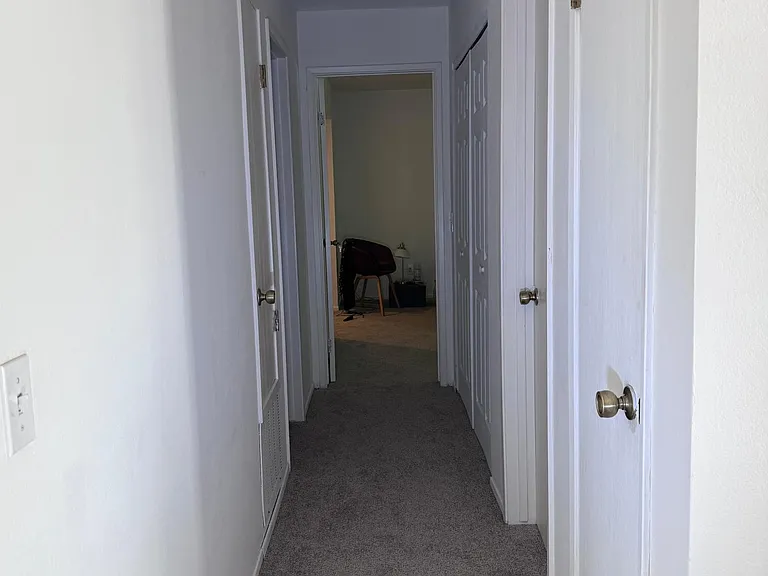 Hall way to master bedroom and 2 bedroom