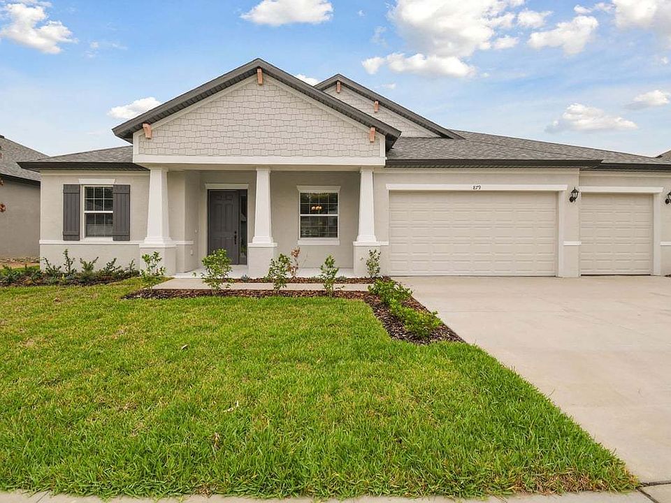 Joyce new construction quick move-in home 879 Tierra Dr. front view at Whiting Estates Spring Hill b
