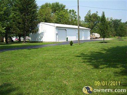 32x32 garage and 32x32 pole barn attached