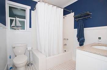 Bathroom w/ heated and custom metro tile floor