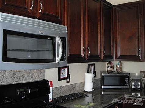 nice kitchen cabinets and micro oven