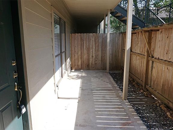Private patio in front of unit.