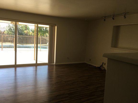 Enter into Family Room overlooking pool