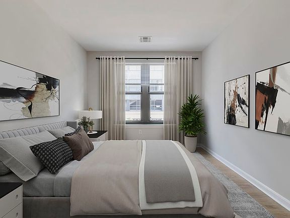Renovated Package II bedroom with hard surface flooring