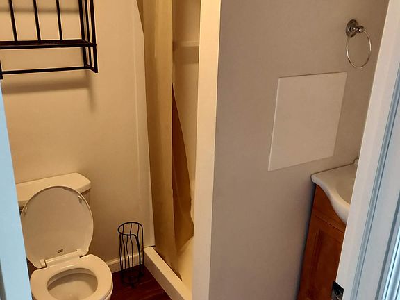Full bathroom off kitchen