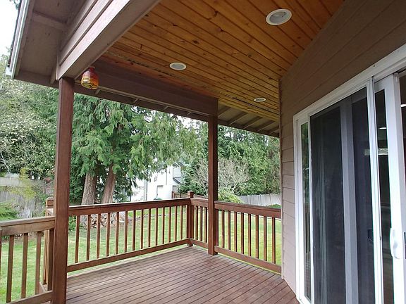 Deck open to backyard for entertaining