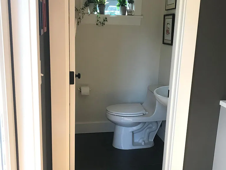 Powder room off of kitchen on main level