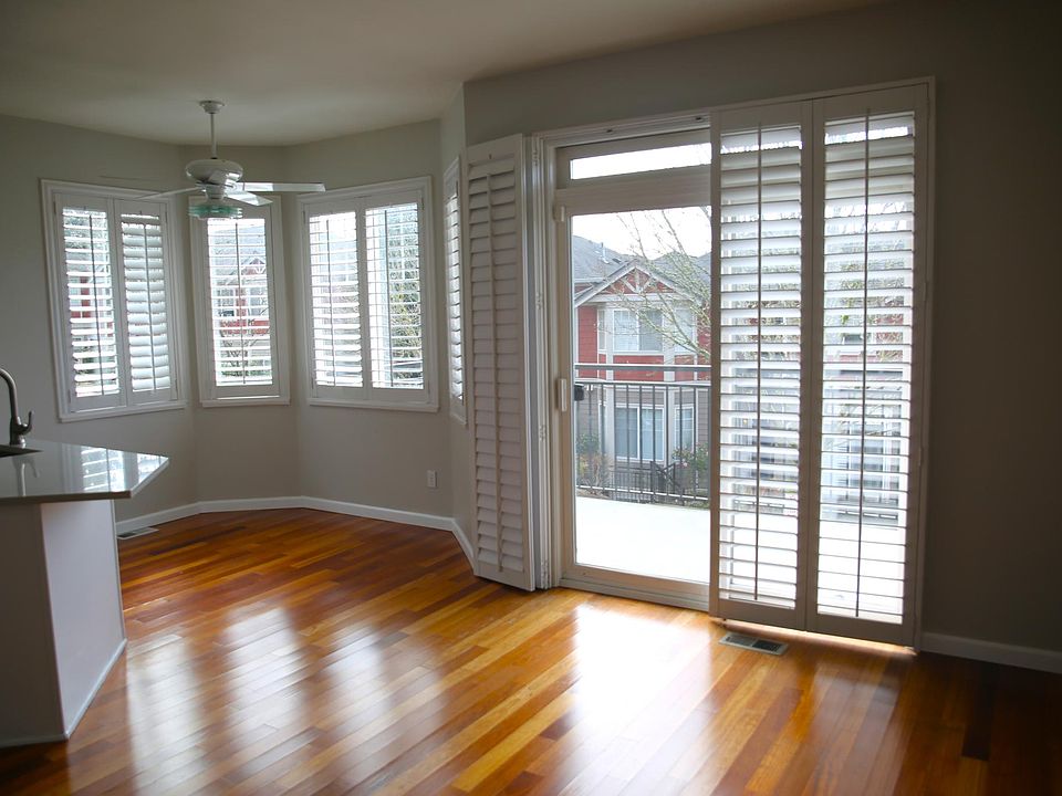 Plantation shutters add character throughout the main level
