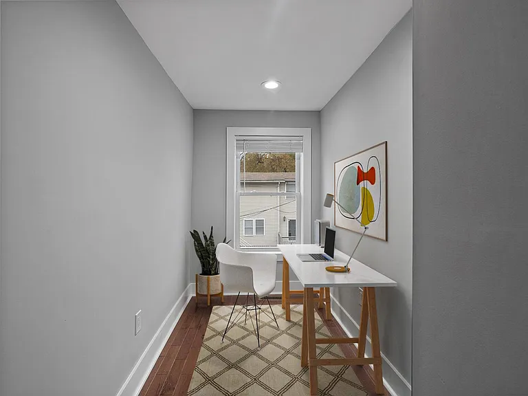 Bedroom 2 Office. This image shows a virtually furnished space. Bedrooms come unfurnished.