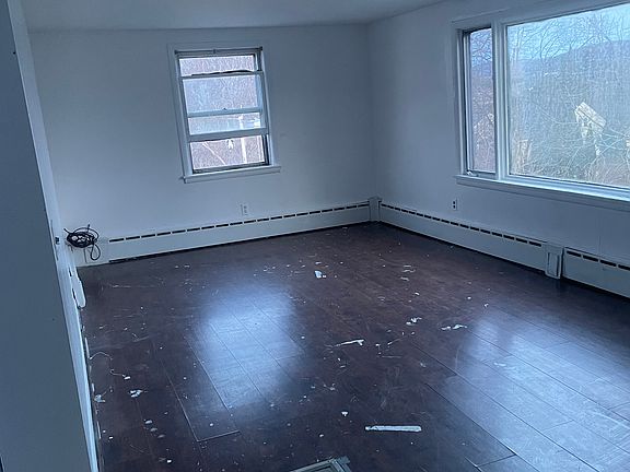 Living room has been repainted, window will be replaced.