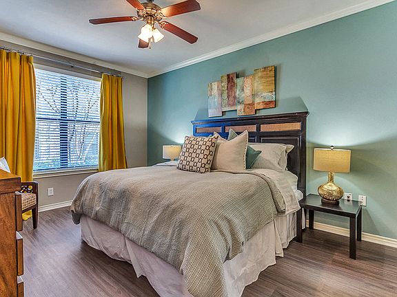 Large Master Bedroom with Lots of Natural Light and hard wood floors