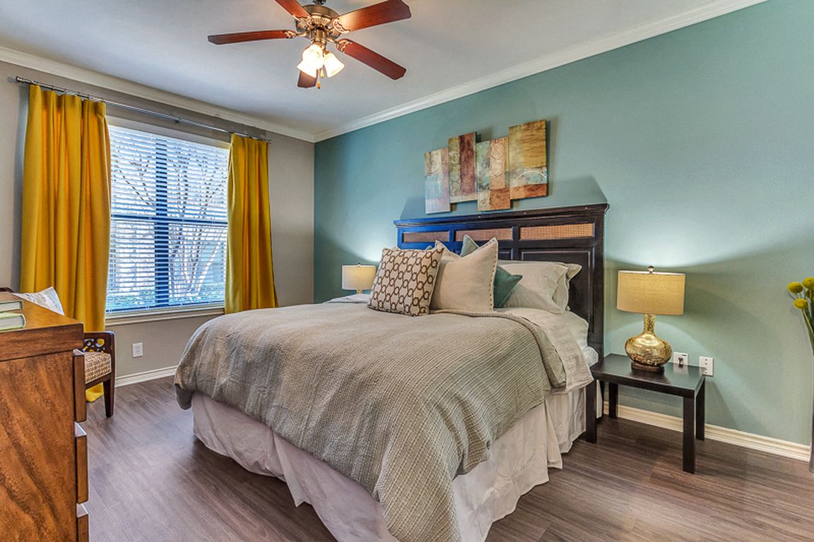 Large Master Bedroom with Lots of Natural Light and hard wood floors
