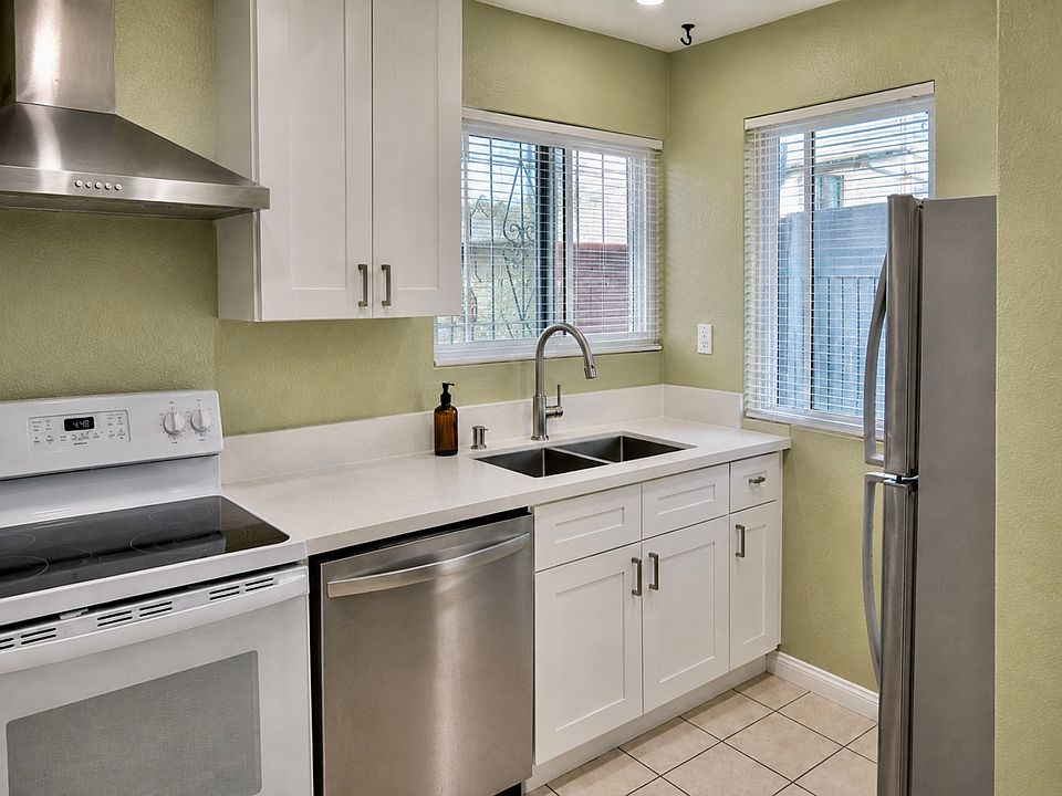 BRAND NEW remodeled kitchen, new countertops, cabinets, sink, faucet, blinds and appliances