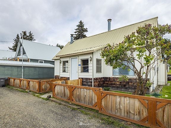 Front of house with parking