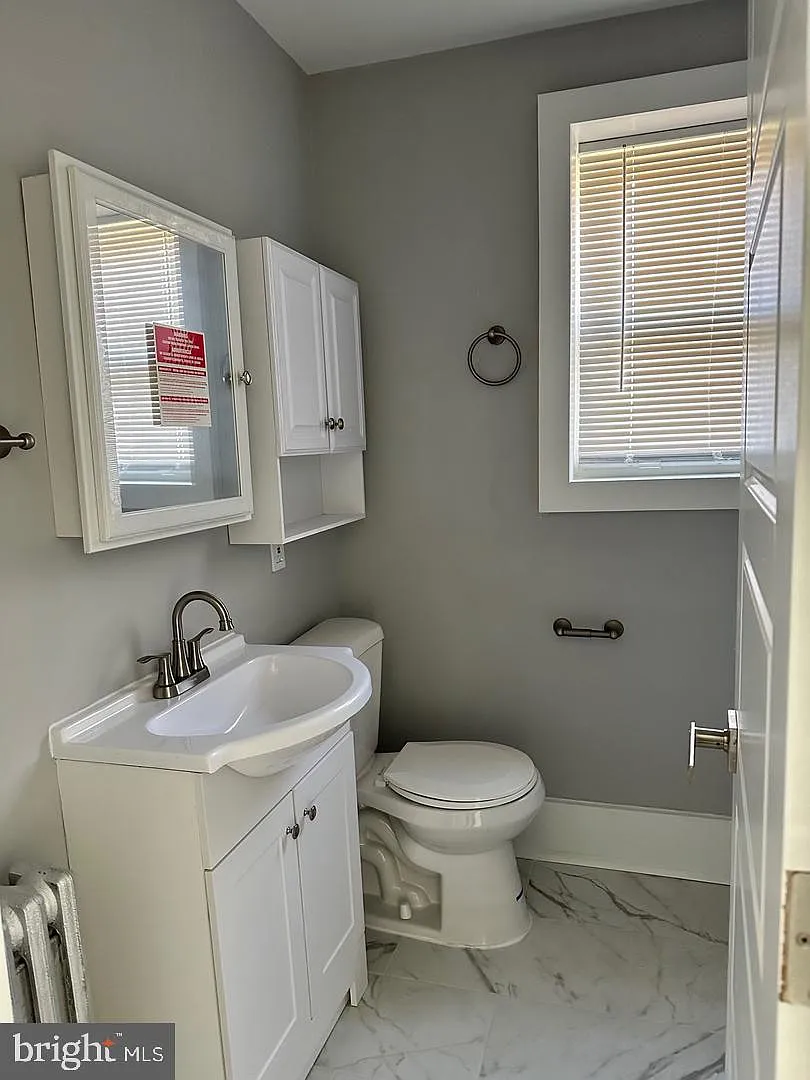 140-144 W Allens Ln — Photo 4