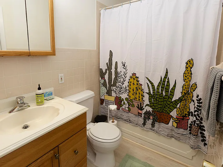 Bathroom with shower and jetted tub
