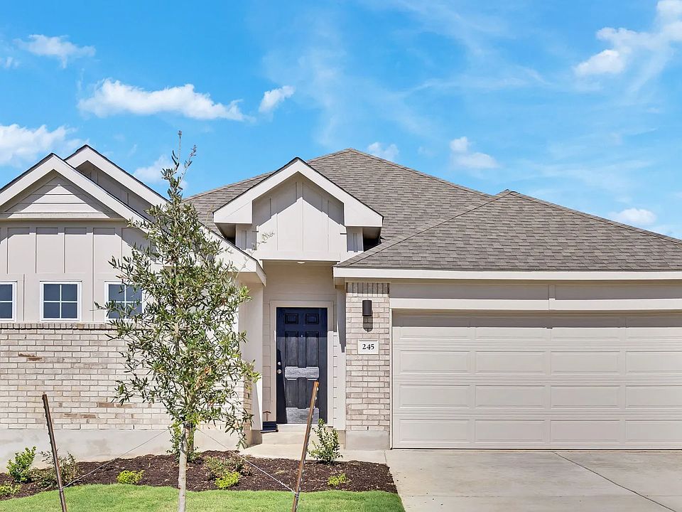 Elegant red exterior with exquisite stone facade and gabled roof, nestled in Calumet s prestigious l