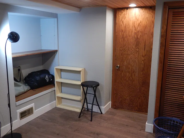 shelving area in bedroom/studio for tv. wired for Comcast