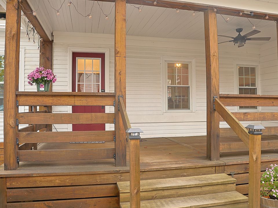 Enter through a private porch into your mudroom.
