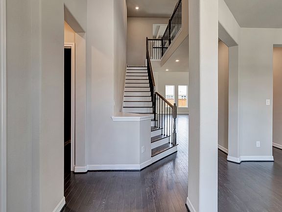 Entryway with grand staircase