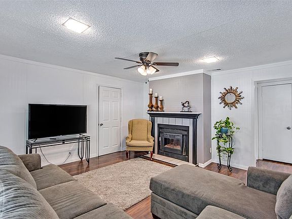 Living Room with Electric Fireplace.