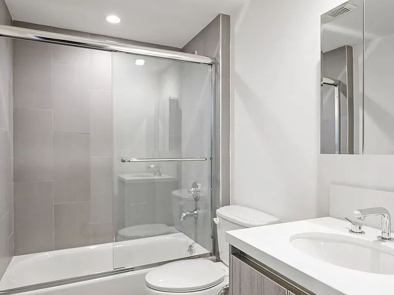 Bathroom with Bathtub with Glass Doors