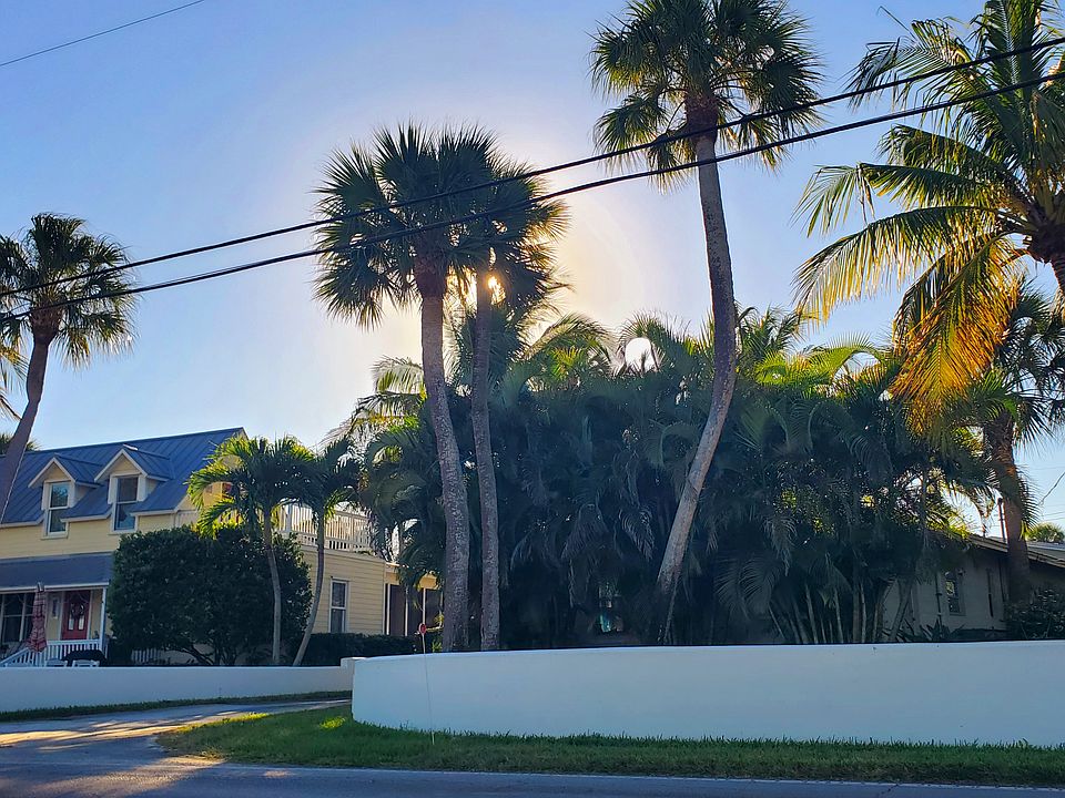 Owner's home on left with rentals on right & behind property