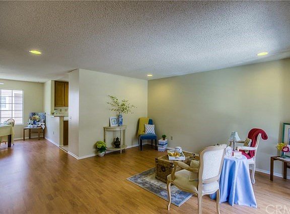Feel the openness of the living room as you step into the unit.  The living room is filled with natural light from the patio and has ample lighting in the evenings from the recessed lights.
