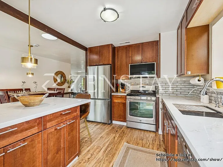 Newly Renovated Open Kitchen and Dining Area with island