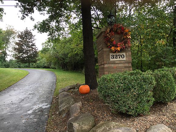 Two lighted brick pillars