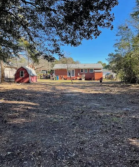 Large, fenced back yard..