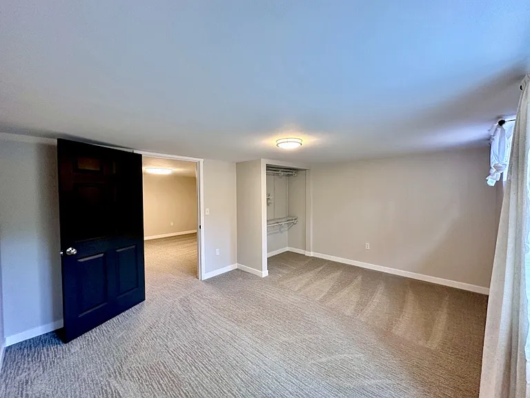 Downstairs bedroom. SW corner.