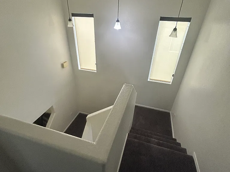Carpeted stairs and Freshly painted interior throughout