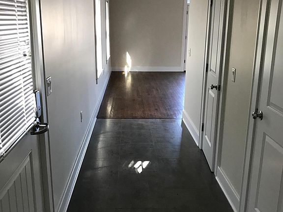 Entry hall with half bath and coat closet