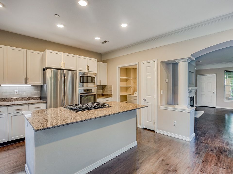 Expansive kitchen island in select homes