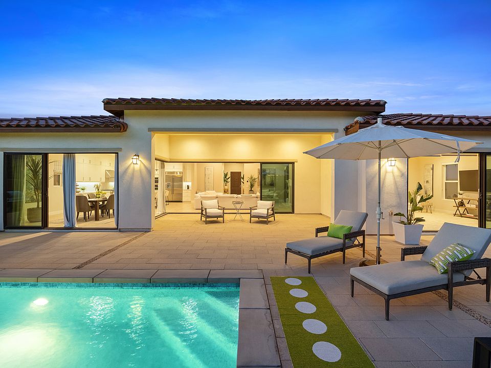 A welcoming outdoor pool, perfect for a refreshing swim and quality time with friends and family to unwind and relax.