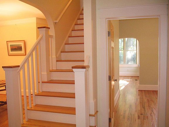 View to Family room/Den to right of stairs.  Dining Room to left of stairs.