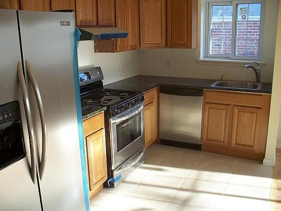 kitchen, stainless steel appliances and granite countertops