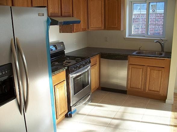 kitchen, stainless steel appliances and granite countertops