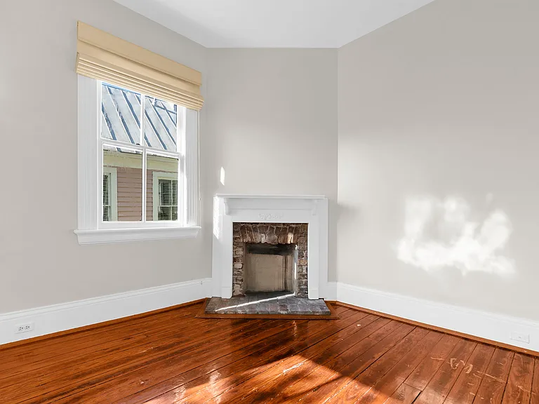 First Bedroom to the Left at the Top of the Stairs with Fireplace